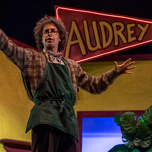 student performing theatre