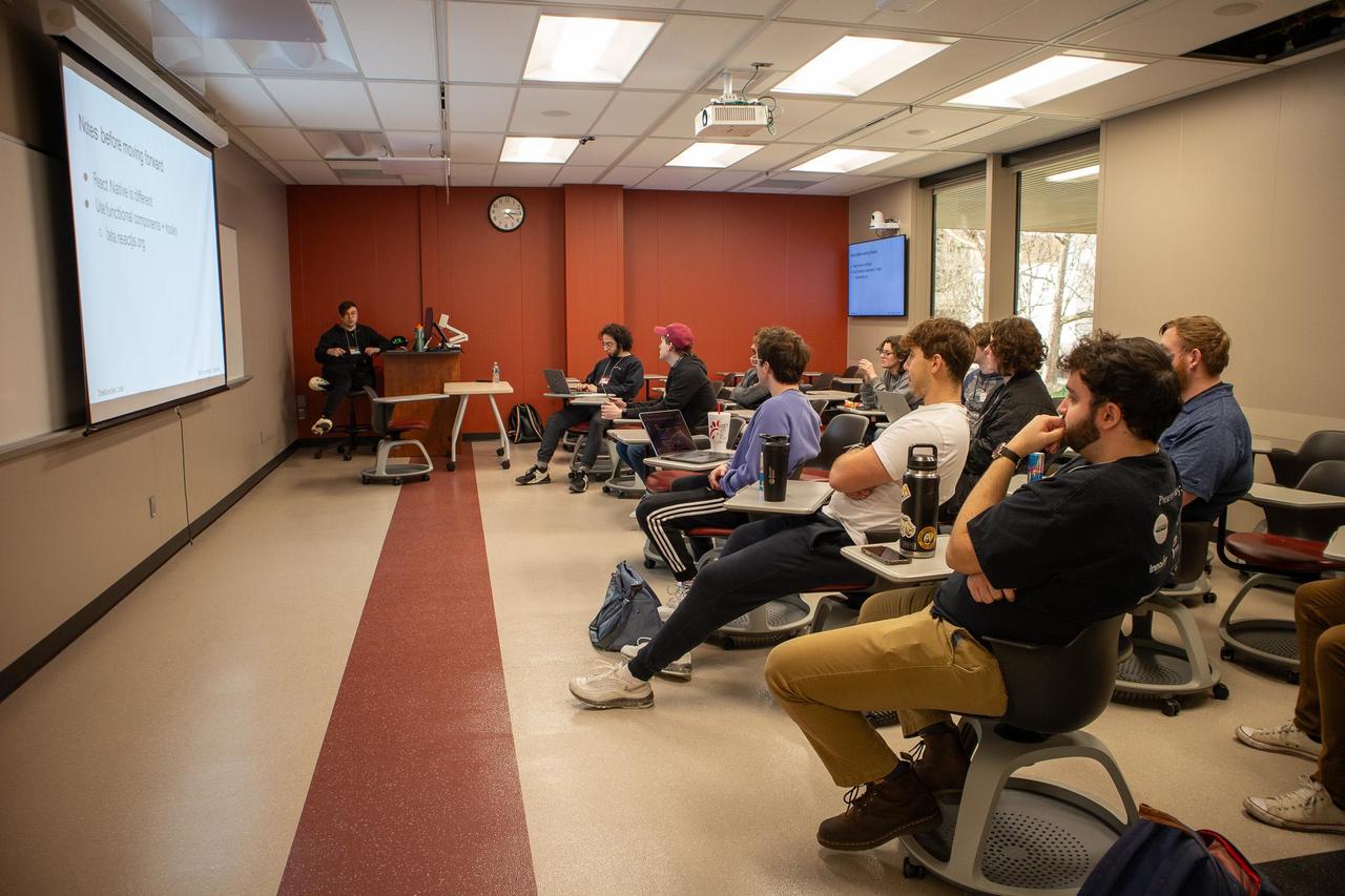 Student Presents creation to other participants at HackYSU 2024