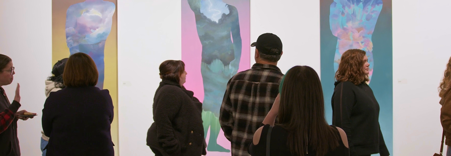 looking at an art piece