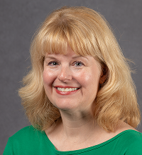 Professional portrait of advisor, Nicole Wells