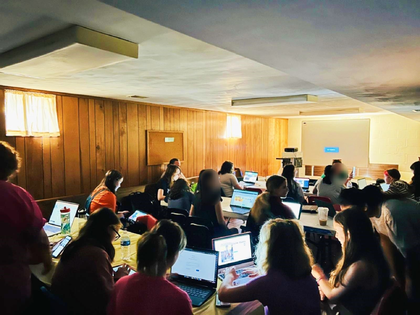 Girl Scouts on computers learn about coding