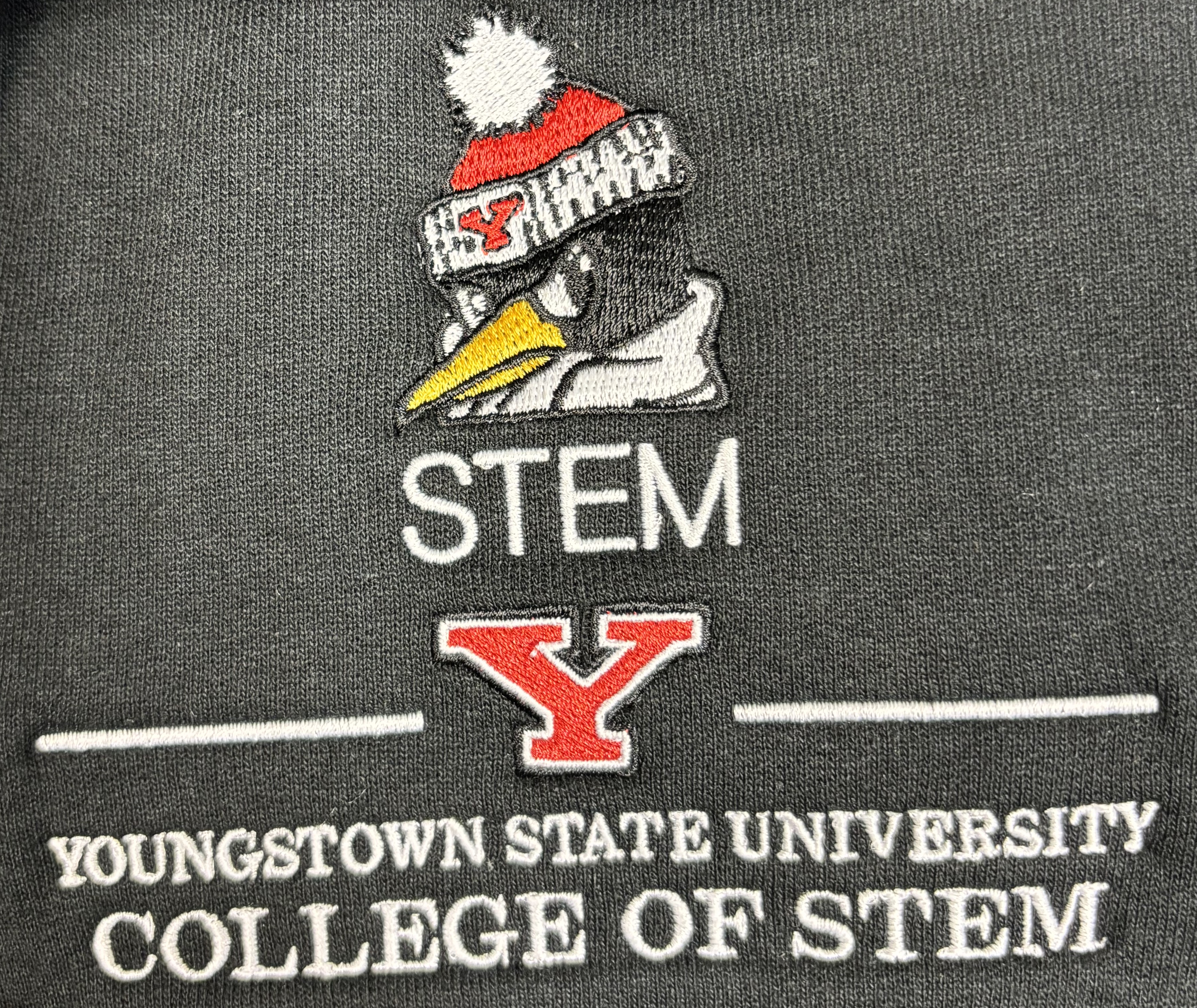 Close up of STEM Logo on Fleece Pullover
